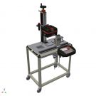 Microdots marking station for tags with picker piled up...